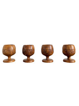 carved wooden goblets