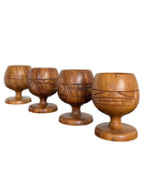 carved wooden goblets